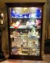 Lighted Beveled Glass Display Case With Mirrored Back And 4 Adjustable Glass Shelves, 80