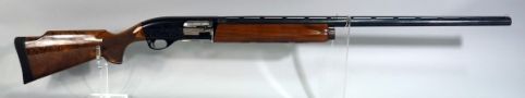 Remington 1100 Magnum 12 Gauge Mag Shotgun SN# L888727M, 2 Chokes, 33